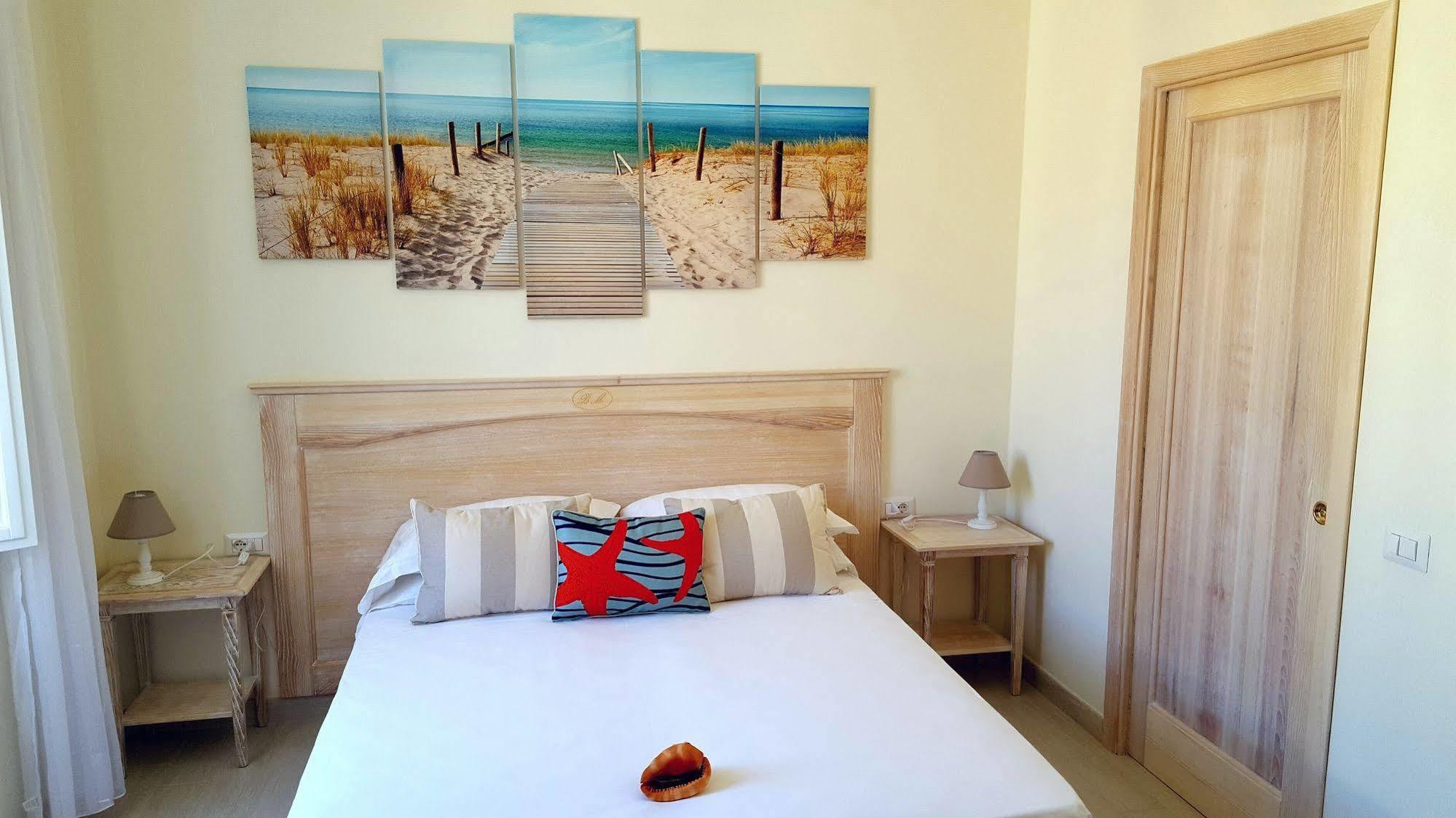Brezza Marina Luxury Rooms Cagliari Bagian luar foto